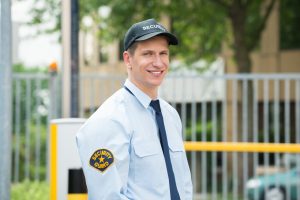 Portrait Of A Happy Young Male Security Guard